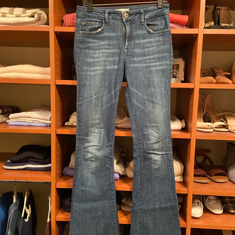 DL1961 medium-dark wash flare jeans.